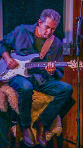 Playing the Guitar - Photo by Jim Patrina