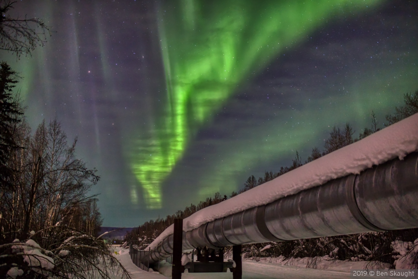 Alaskan Pipeline under the Aurora by Ben Skaught