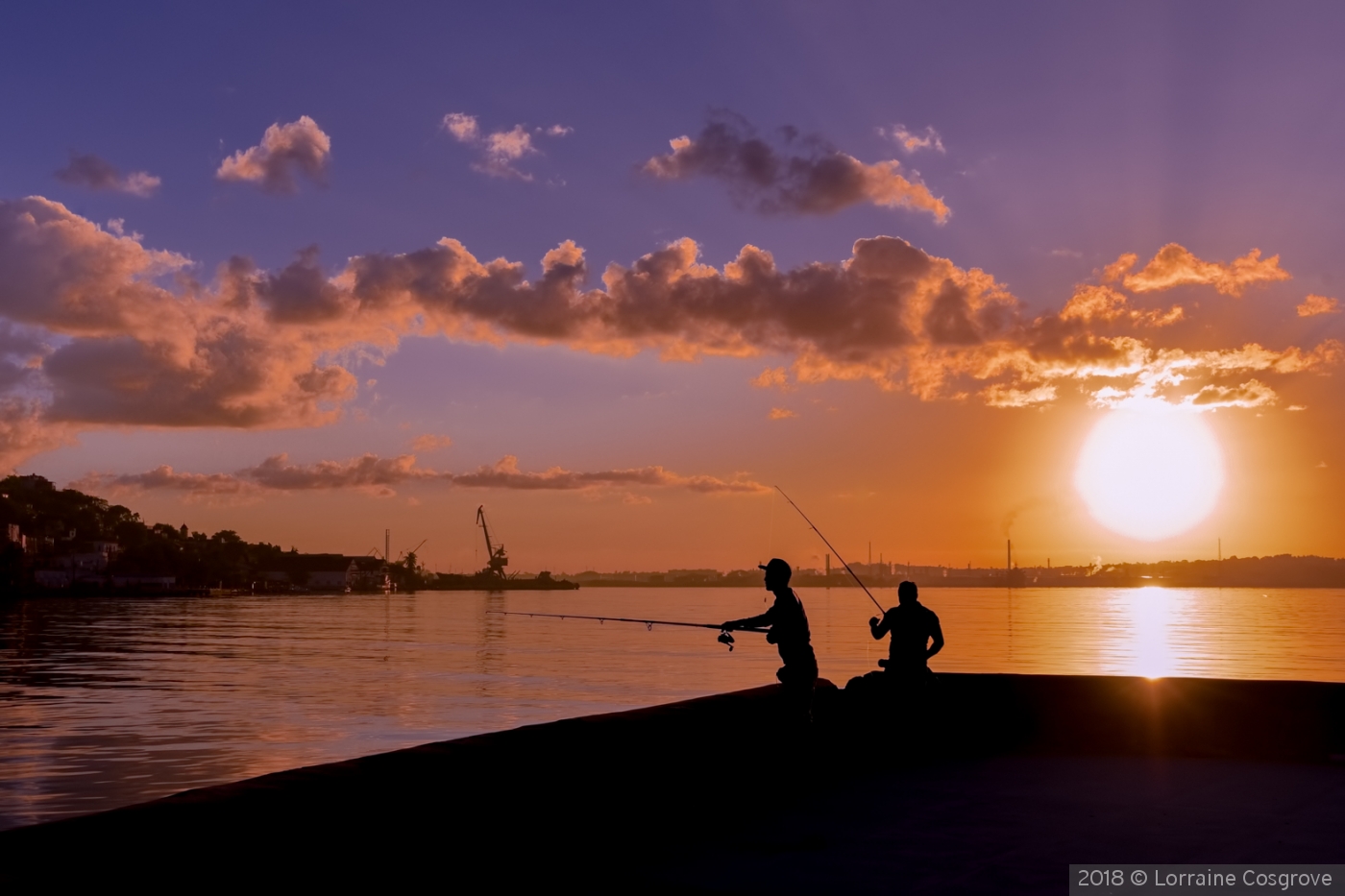 Fishing on the Malecon at Sunrise by Lorraine Cosgrove