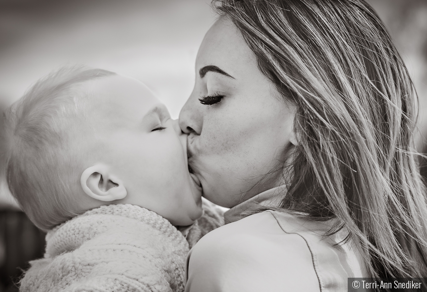 Giving Mommy kisses by Terri-Ann Snediker