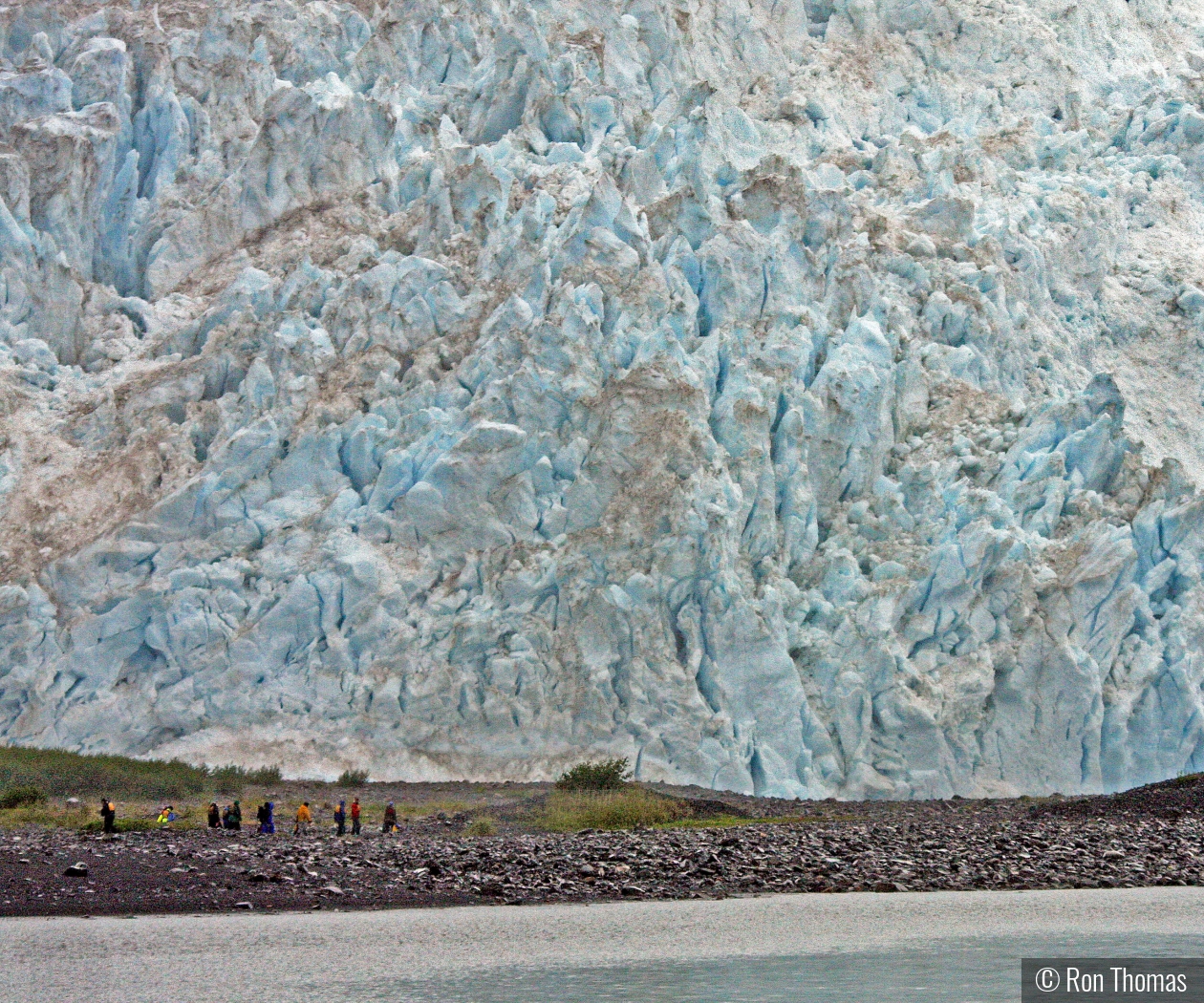 Hiking near a glacier by Ron Thomas