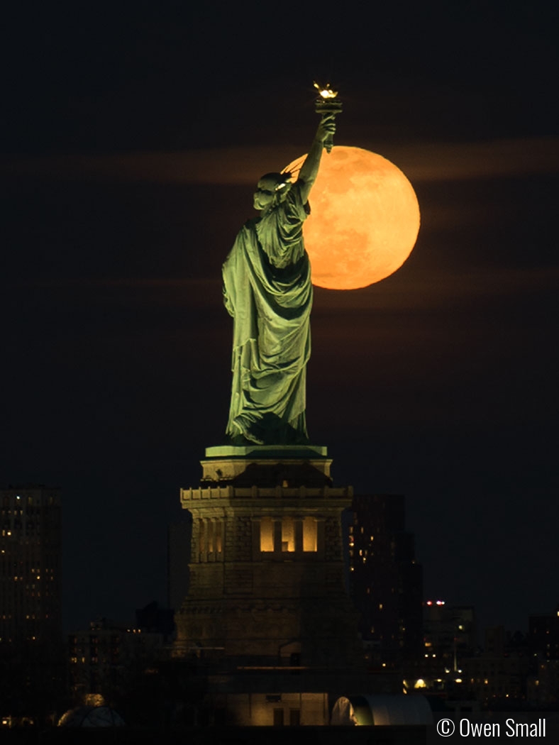 Lady Liberty and Super Moon by Owen Small