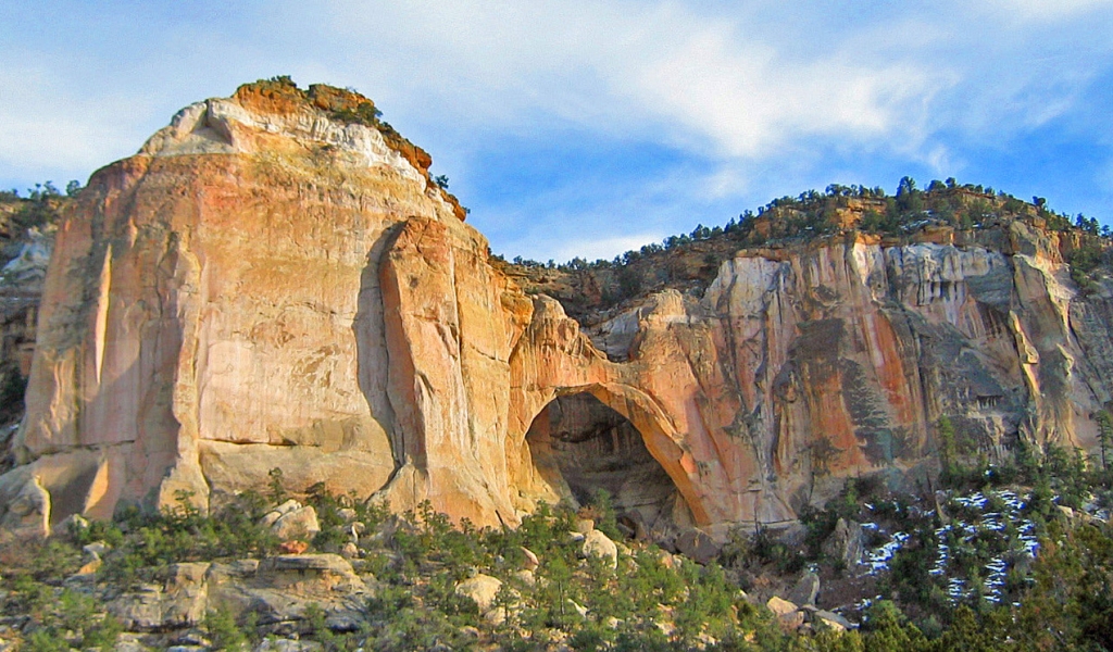 Late Afternoon  at New Mexico's Natural Arch by Lou Norton