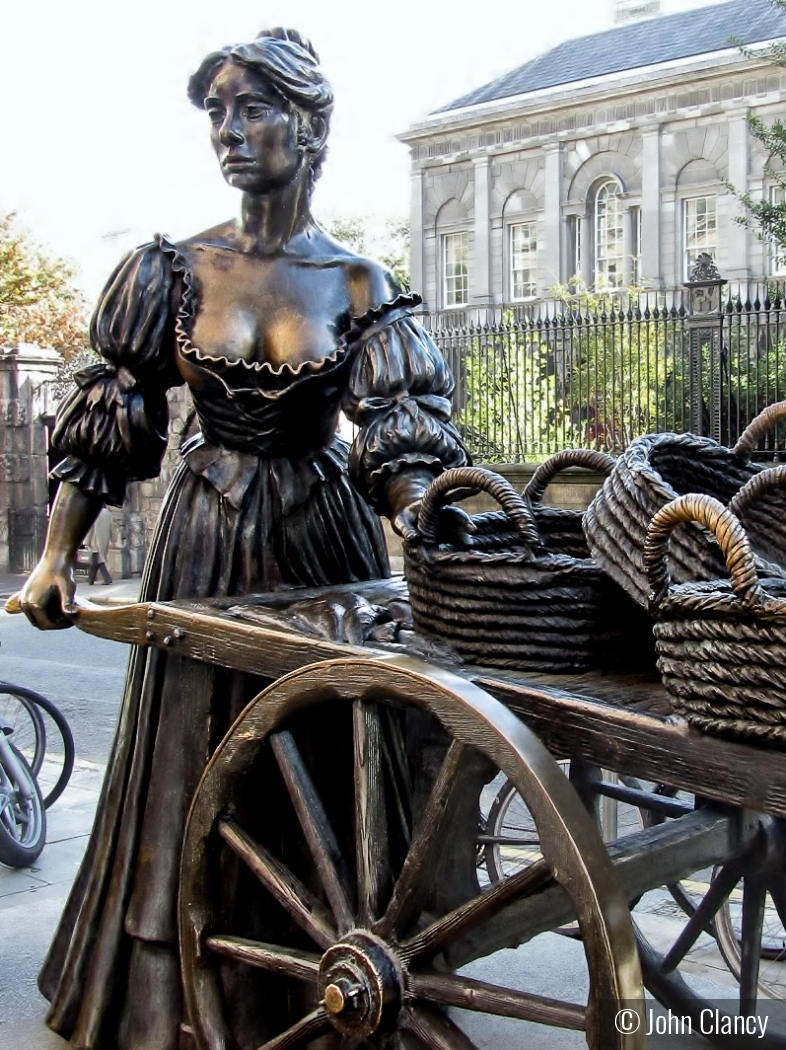 Molly Malone and her peddling cart by John Clancy