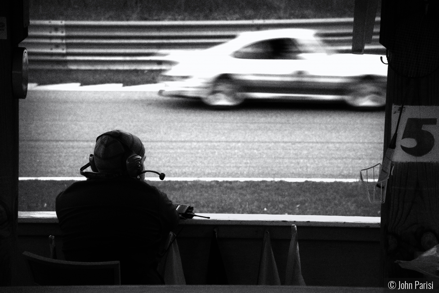 monitoring the race track by John Parisi