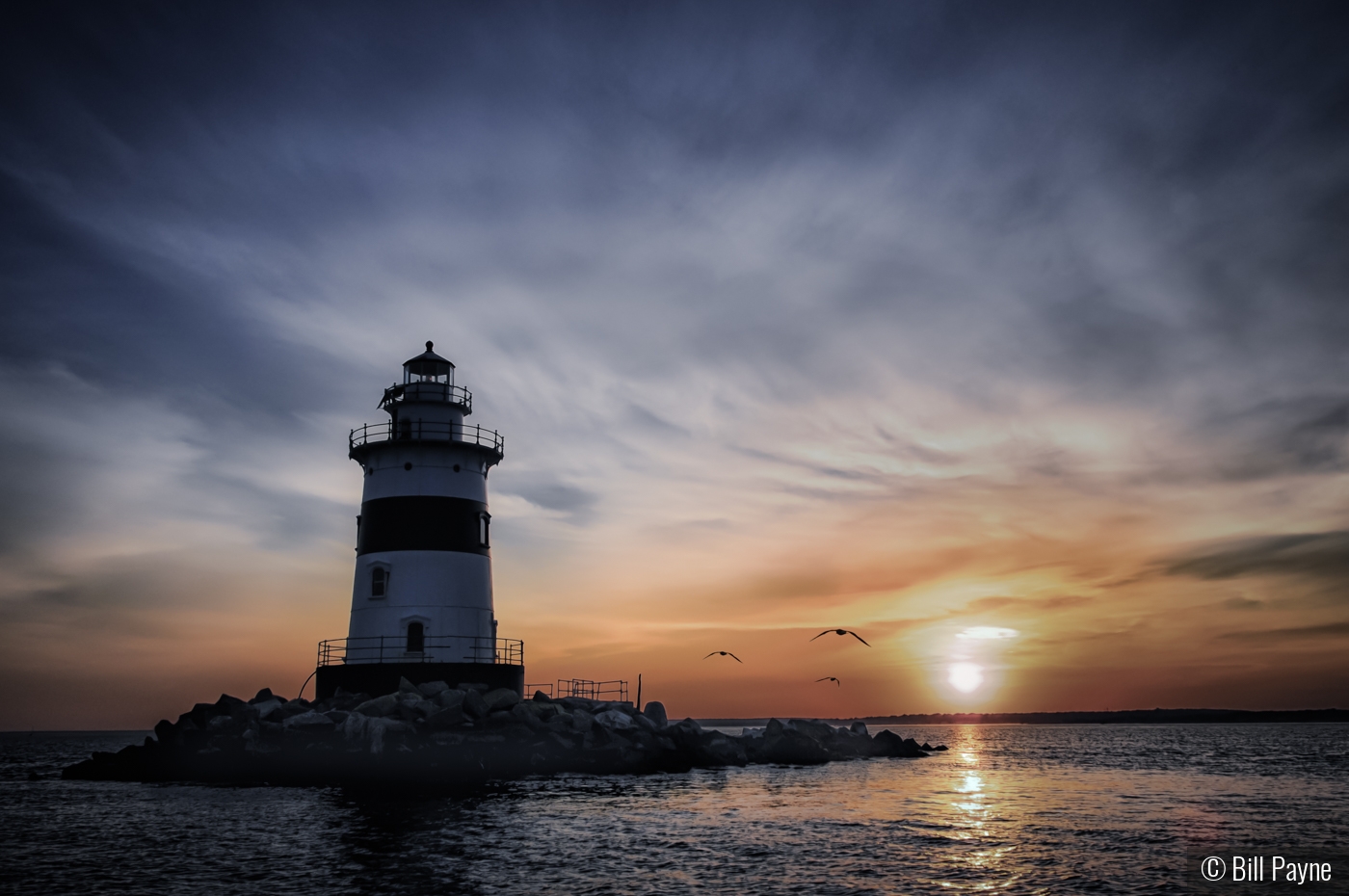 Passing Latimer Reef Lighthouse at Dusk by Bill Payne