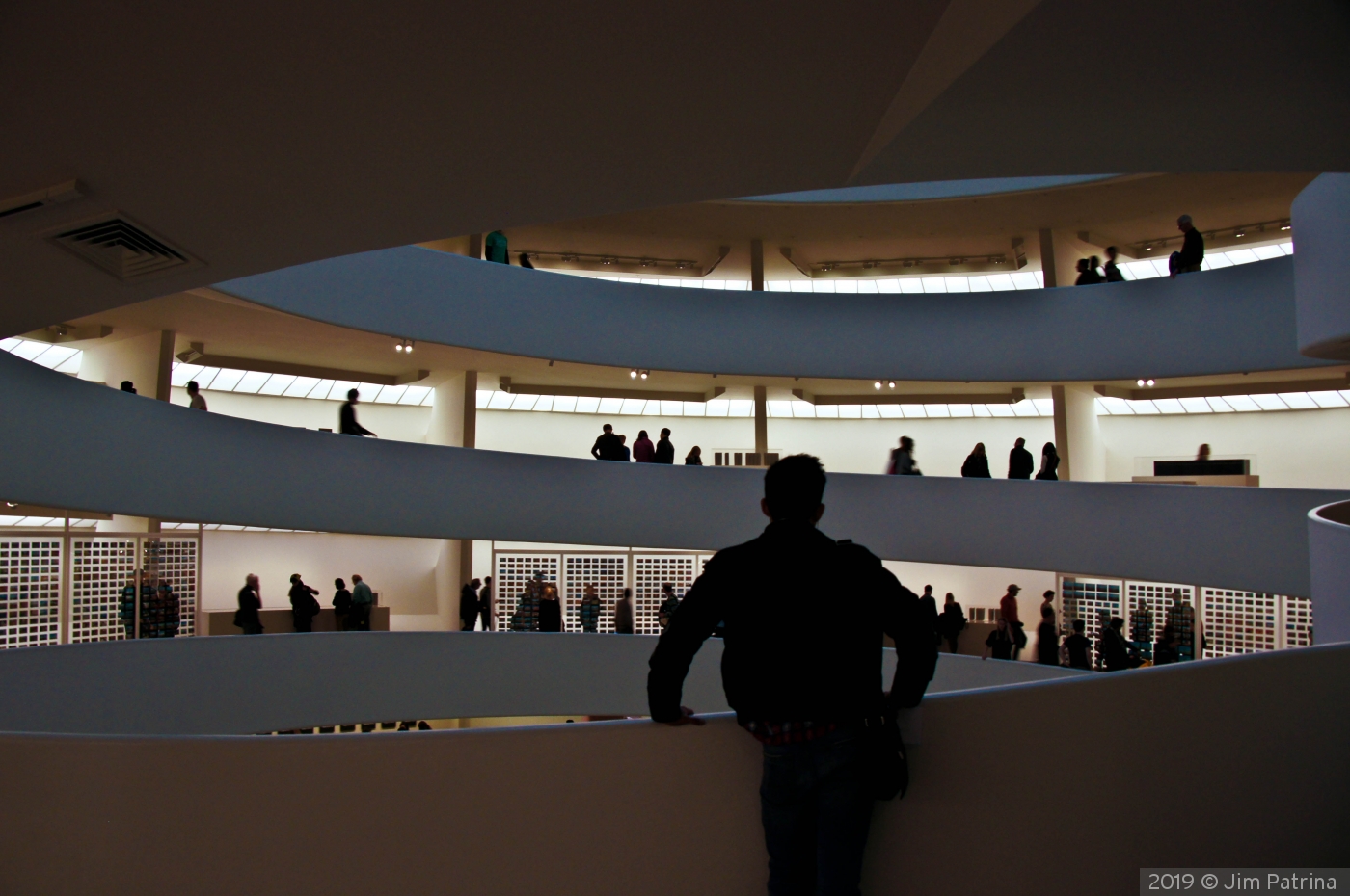 People watching at the Guggenheim by Jim Patrina