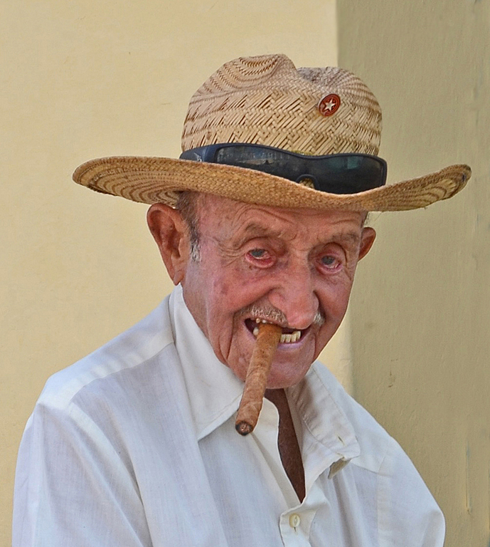 Rheumy-eyed Cuban Revolutionary With A Cigar by Lou Norton