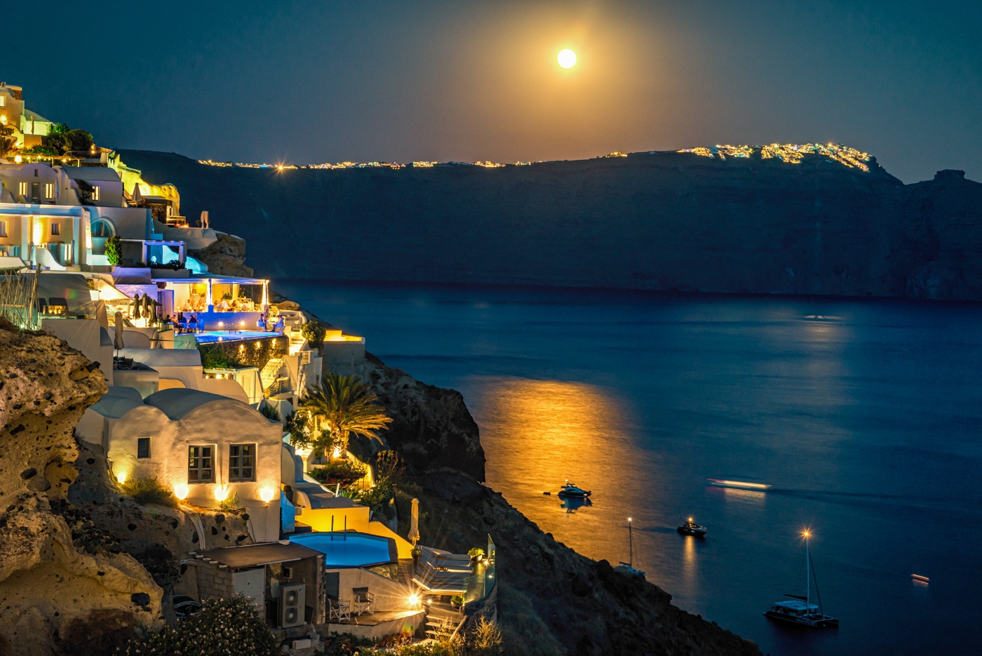 Santorini Greece view of a full moon by Bill Payne