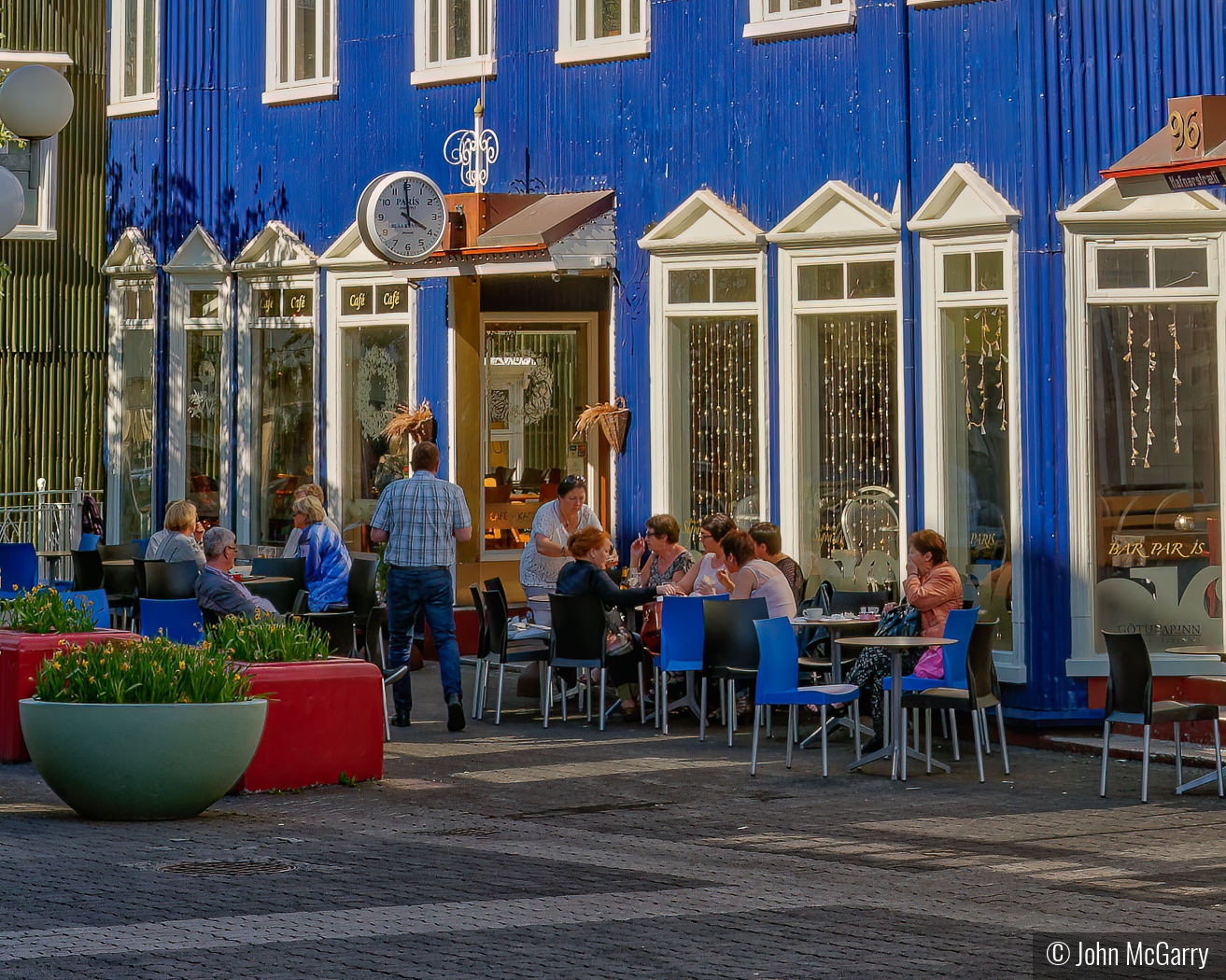 Sidewalk Cafe in Akureyri by John McGarry