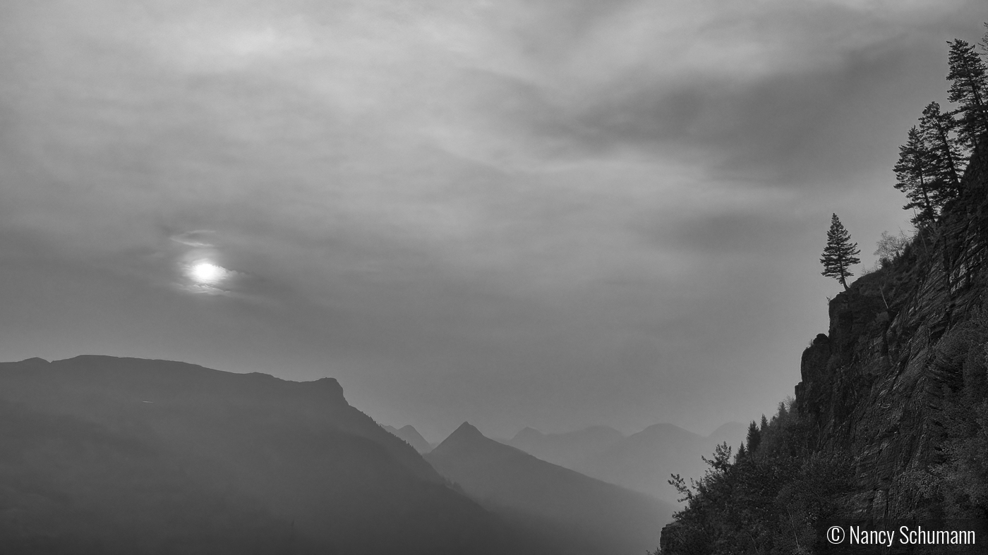 Smoky Skies in Glacier National Park by Nancy Schumann