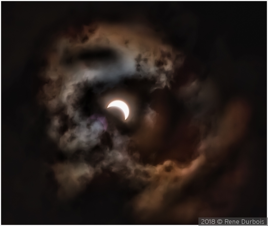 Solar Eclipse Cloud Jumping by Rene Durbois