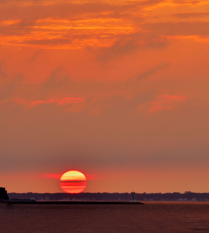 Sunrise Over Westbrook Jetty - Photo by John Straub