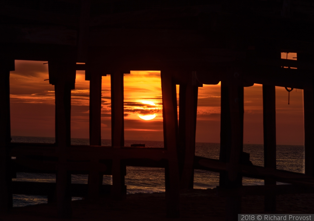 Sunrise under the pier by Richard Provost