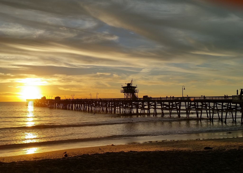 Sunset at The Pier by Kathleen Miller