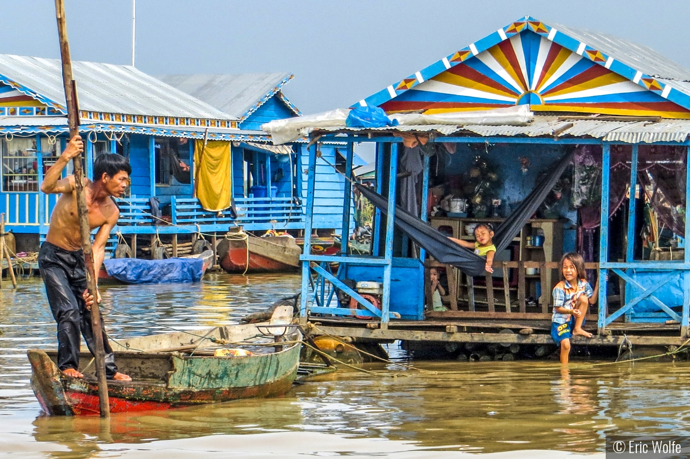 Taunting Child, Cambodian Floating Village by Eric Wolfe
