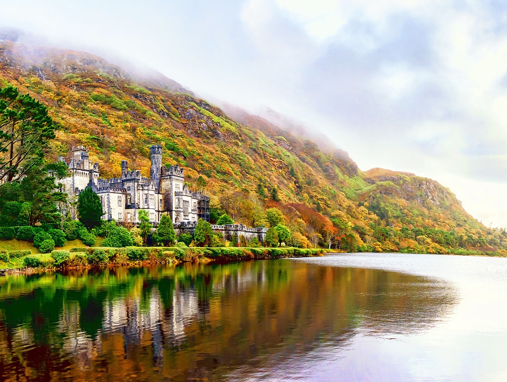 The Fog Lifts Over Kylemore Abbey by John Straub
