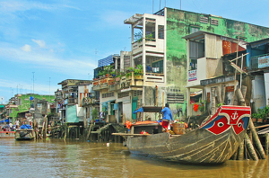 Busy Mekong Riverfront - Photo by Louis Arthur Norton
