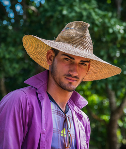 Cuban Farmer Wearing Straw Hat - Photo by Lorraine Cosgrove