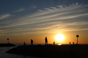 Fisherman At Sunset - Photo by Bill Latournes