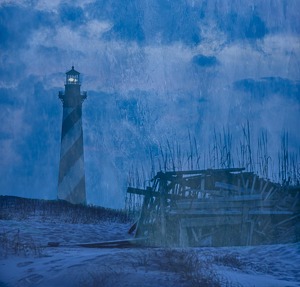 Hatteras light house through clouds - Photo by Richard Provost