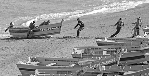 Hauling A Moroccan Fishing Boat Ashore - Photo by Louis Arthur Norton