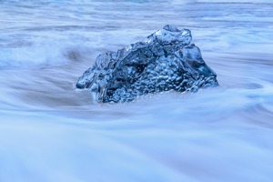 Ice in swirling water - Photo by Richard Provost