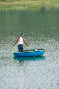 Local Fisherman in a pond -Mysore India - Photo by Aadarsh Gopalakrishna