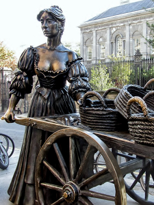 Molly Malone and her peddling cart - Photo by John Clancy