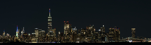 New York city Skyline at night - Photo by Owen Small