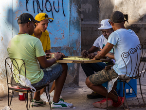 Playing dominoes - Photo by Nancy Schumann