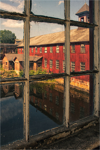 Through an Old Factory Window - Photo by Alene Galin