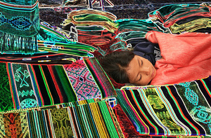 Tucked-in Dreamer at Ecuadorian Market - Photo by Eric Wolfe