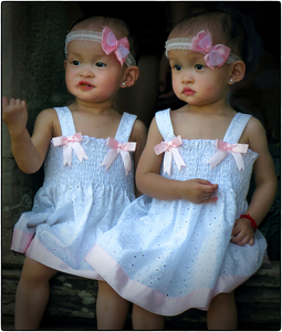 Twins in Pink and White - Photo by Louis Arthur Norton