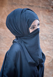 Young Nabatean Girl Wearing Her Niqab - Photo by Louis Arthur Norton